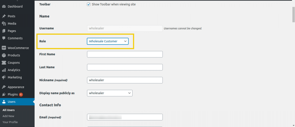 Assigning a user to the Wholesale Customer role.