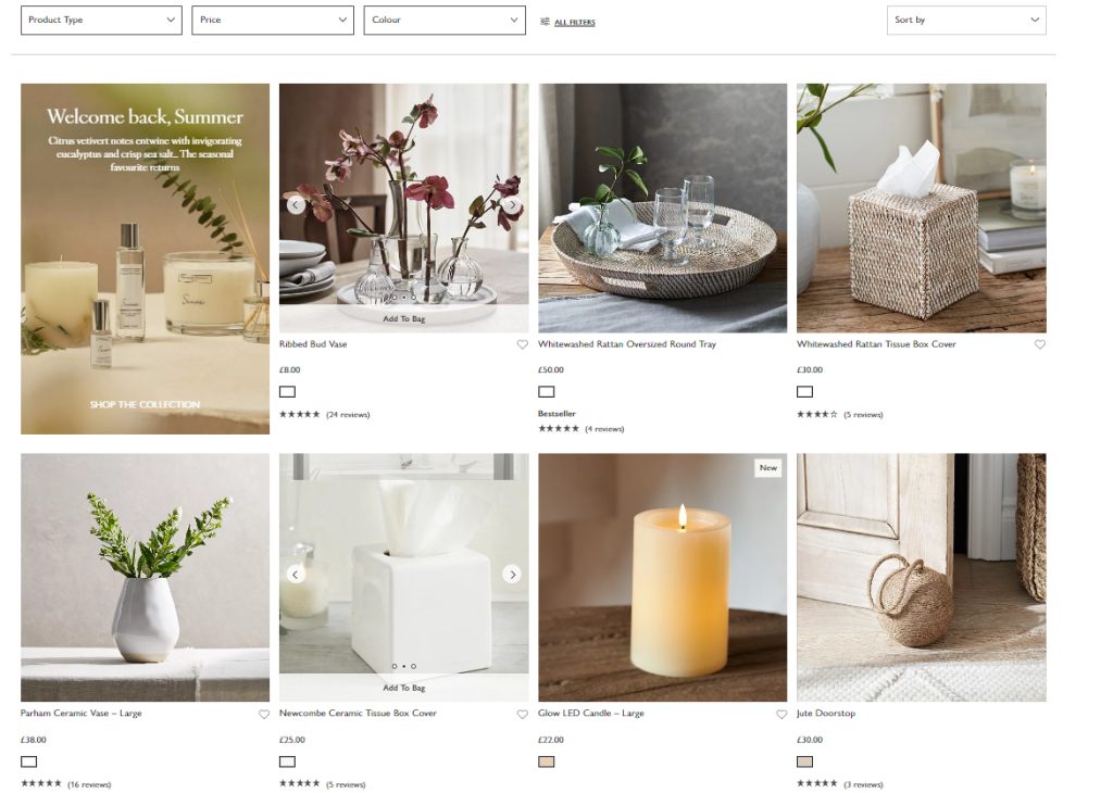 Website that showcases an inventory of home decor, including candles, tissue holders, vases, and trays. 